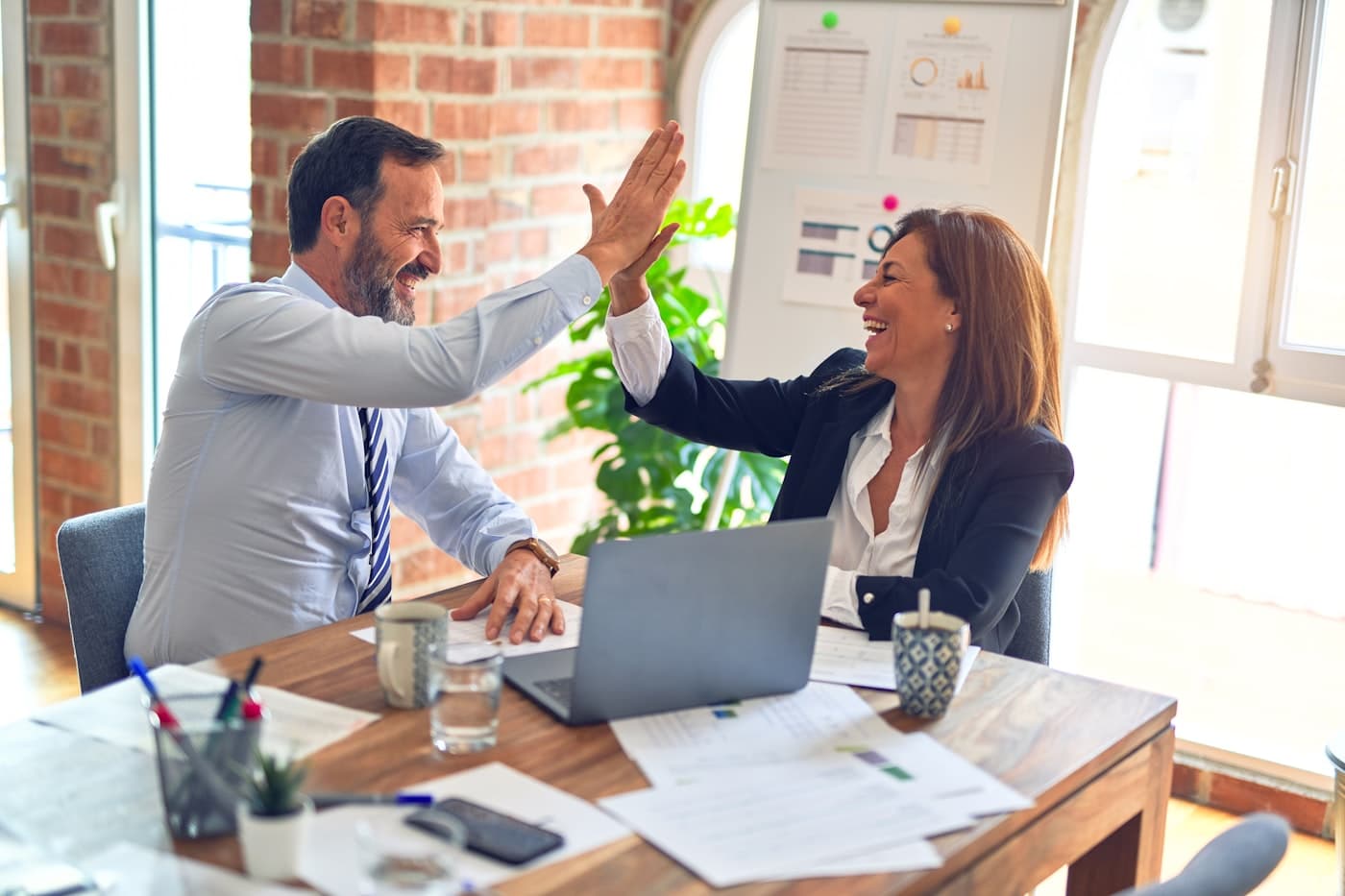 An Australian professional services team working alongside their XoomAgent™ AI employee